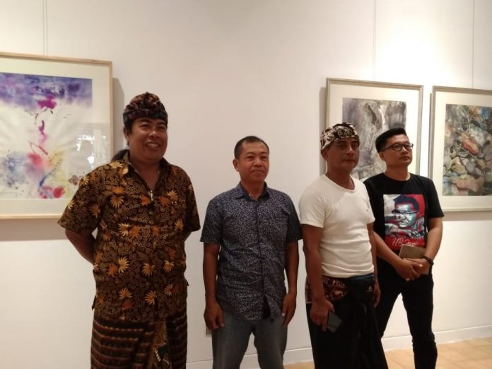 Left to right: Made Dollar Astawa, Nur Ilham, Made Mahendra Mangku, and Wayan Seriyoga Parta at the exhibition's press conference, on Thursday.